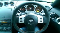 350Z - padded (2mm), black alcantara on the sides, perforated leather top-bottom, orange stitching.jpg