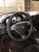 987997-Triangular-airbag-Black-Thicker-Thumb-grips-Added-Perforated-leather-on-sides-Smooth-too-bottom-Red-centre-stripe-at-12-oclock-Dark-grey-416-stitching-1