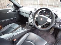Cayman-2007-Triangular-airbag-Black-Thicker-Thumb-grips-added-Alcantara-on-sides-Smooth-leather-top-bottom-Orange-stitching