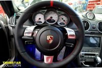 997,987 round airbag - thicker, perforated sides, nappa top-bottom + red centre centre band, red stithing