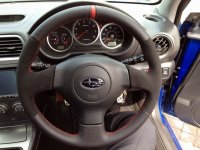 Impreza STI 05-07 - Black alcantara 9040 sides, Black perforated leather topbottom + red cente stripe at 12 o'clock, Red Stitching 1