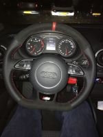 Audi S3  2015 -  Perforated leather on sides,  Black Alcantara topbottom + Red centre stripe, Red Stitching