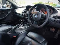 E63 SE sport 2004 ( No Paddles) - Modified with the flat, Smooth leather on sides, Black Alcantara 9040 top-bottom, Light Silver 412 stitching 2