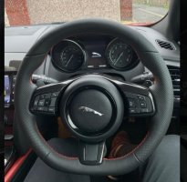 Jaguar-F-type-round-Slighlty-thicker-Thumb-grips-added-Flat-bottom-Perforated-leather-on-sidesSmooth-top-bottom-Red-stitching-1
