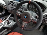F22-M-sport-with-paddles-Black-Alcantara-Red-centre-stripe-Red-stitching-3