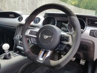 Mustang 2016 – Thicker, Thumb gripsadded + Flat bottom, Perforated leather on sides, Alcantara top-bottom ,Orange stitching 2