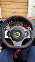 Lotus-Evora-Slightly-thicker-Perforated-leather-on-sides-Nappa-top-bottom-Red-centre-stripe-at-12-oclock-Red-stitching