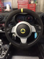 Lotus-Exige-350-Sport-Dark-grey-Alcantara-9002-Smooth-leather-on-the-inner-section-Yellow-centre-stripe-at-12-oclock-BLACK-stitching-2