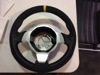 Lotus-Exige-350-Sport-Dark-grey-Alcantara-9002-Smooth-leather-on-the-inner-section-Yellow-centre-stripe-at-12-oclock-BLACK-stitching