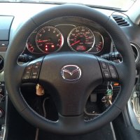 Mazda 6 - thicker, thumb grips added, perforated sides smooth top and bottom white stitching.JPG
