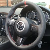 MX5 mk3 - Slightly thicker, Thumb grips added, Perforated leather on sides, Nappa topbottom + Red centre stripe, Red stitching 2