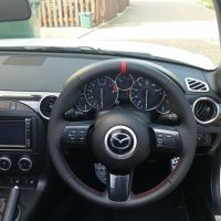 MX5 mk3 - Slightly thicker, Thumb grips added, Perforated leather on sides, Nappa topbottom + Red centre stripe, Red stitching 3