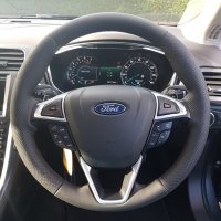 Mondeo-2017with-MF-buttons-and-Paddles-–-Perforated-leather-on-sides-Smooth-topbottom-Black-stitching-1