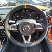 MX5-mk4-Dark-Grey-Alcantara-9002-on-sides-Smooth-leather-top-bottom-Orange-centre-stripe-Orange-stitching-1