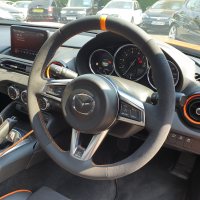 MX5-mk4-Dark-Grey-Alcantara-9002-on-sides-Smooth-leather-top-bottom-Orange-centre-stripe-Orange-stitching-2