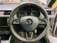 Octavia-vRS-2015-Round-with-paddles-Slightly-thicker-Perforated-leather-on-sides-extended-Smooth-ONLY-top-Red-centre-stripe-Red-stitching-1