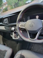 VW-T6.1-Full-Modification-with-Flat-bottom-Perforated-leather-on-sides-Smooth-top-bottom-Red-stitching-2