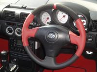 Toyota-Slightly-thicker-Red-perforated-leather-on-the-sides-Black-alcantara-ONLY-top-Black-nappa-leather-ONLY-bottom-Red-centre-stripe-Red-stitching