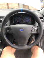 Volvo-v50-2012-Bluetooth-Controls-Slightly-thicker-Thumb-grips-added-Perforated-leather-sides-Smooth-top-bottom-Blue-centre-stripe-Blue-Stitch