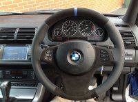E53 facelift - slighlty thicker, perforated sides, black alcantara + blue band at 12 o'clock, M stitching 3
